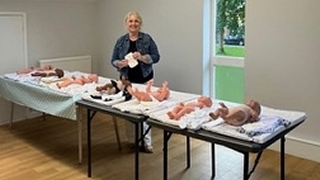 Sharon at Midwives for Mothers preparing for a practical training session